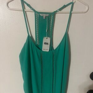 This is a beautiful green ligh weight Naked Zebra blouse. Size L. Brand new.